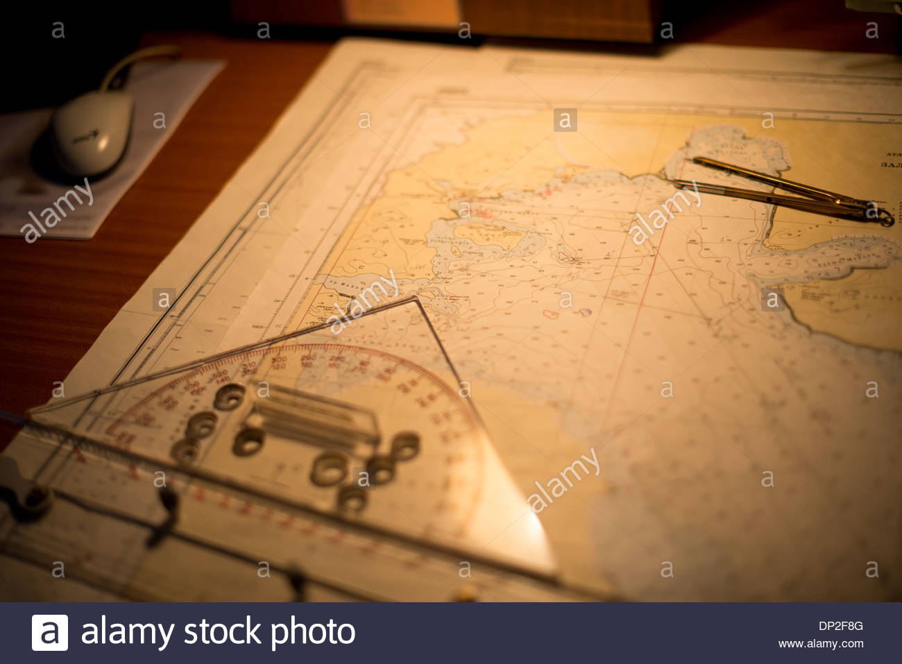 antarctica-navigation-charts-on-a-map-table-on-the-bridge-of-an-antarctic-DP2F8G.jpg