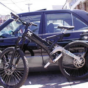 00' MC San Andreas DHS

Manitou Stance 6.5" rebuilt
Factory serviced for 7" up from 6"
SRAM drive
Raceface Forged
HED DH specs 
Hayes Mag +