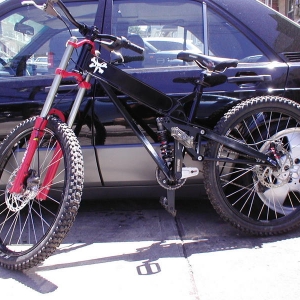 99 Balfa BB7 shown with old fork. Will update:

99' Reg size frame. Upped to 9" travel with mods
SRAM drive
Raceface BB and Cranks
Sun Double wides
Hayes Mags

24" DW mods